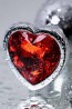 Silver anal plug with pink gem heart-shaped