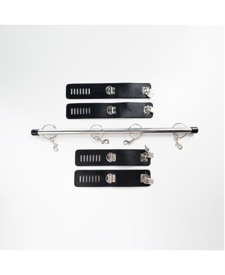 Spreader bar with wrist and ankle cuffs